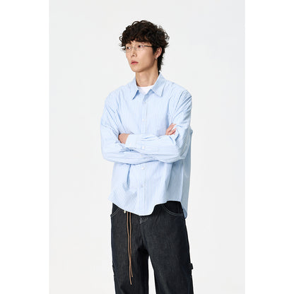 Women’s oversized shirt blouse with Kent collar, breast pocket, and rounded hem EVA-US