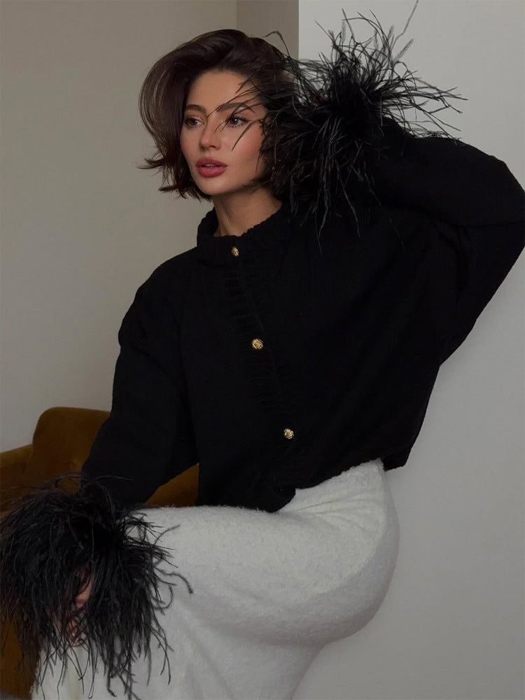 Women's knitted cardigan with feather trim at sleeve cuffs and golden decorative buttons EVA-US