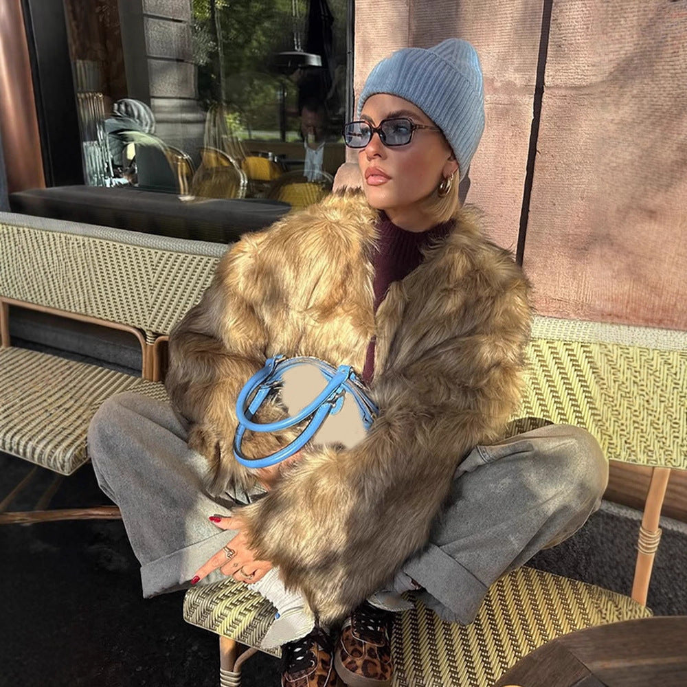 Women's short faux fur jacket with oversized sleeves and plush collar EVA-US