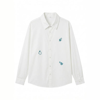 Women's oversized shirt blouse with fine embroidery appliqués and elongated hem down