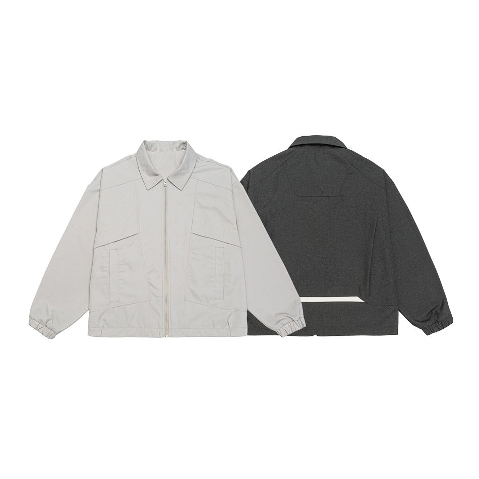 Unisex short jacket in boxy cut with continuous zipper and flap pockets EVA-US