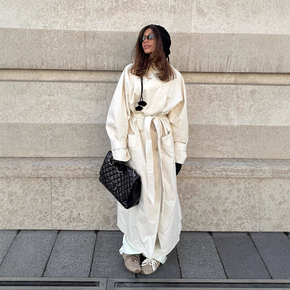 Women's maxilength tailored trench coat made of a light cotton blend with a tie belt EVA-US