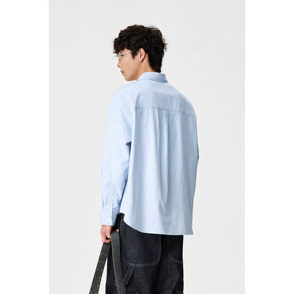 Women’s oversized shirt blouse with Kent collar, breast pocket, and rounded hem EVA-US