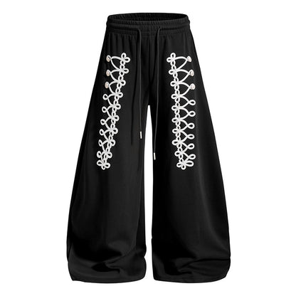 Women's loose jogging pants with elastic waistband and decorative lacing EVA-US