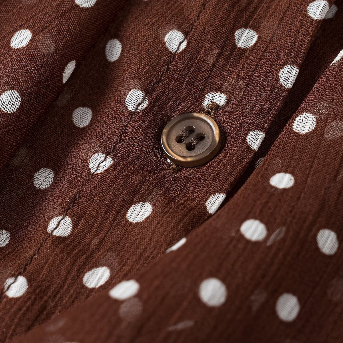 Women's semi-transparent chiffon blouse with dots, ruffle details and bow collar EVA-US