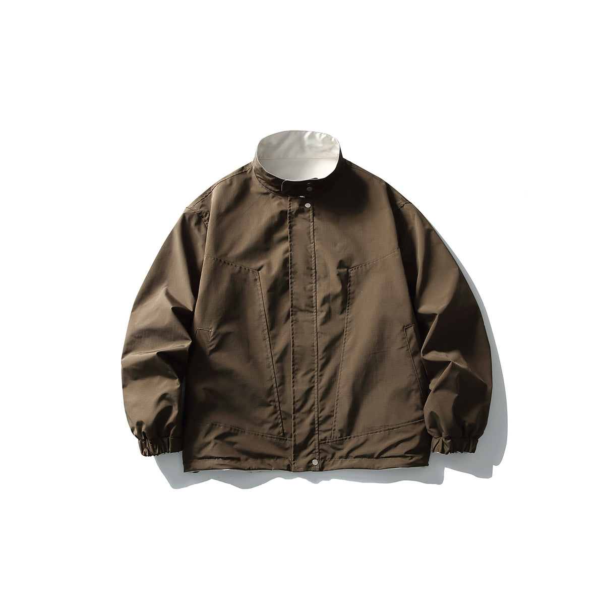 Unisex Lightweight wind and water-repellent oversized boxy jacket with stand-up collar and elastic hem EVA-US