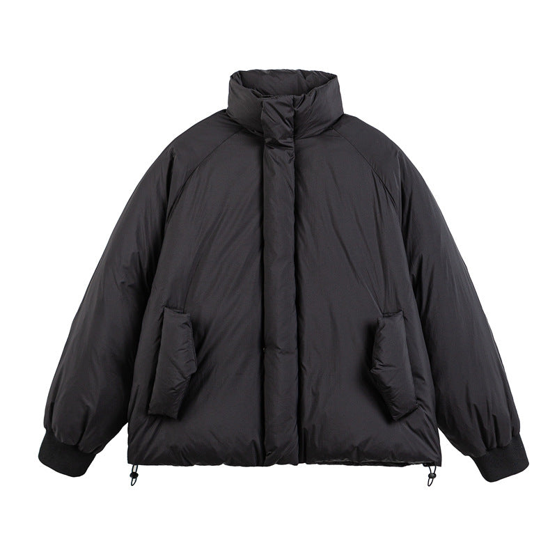 Unisex Boxy-padded short jacket with high stand-up collar, raglan sleeves and drawstring hem EVA-US