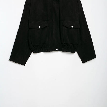 Women's tailored velvet bomber jacket with stand-up collar, shoulder epaulettes, and large flap pockets