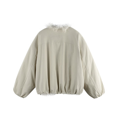 Women's short jacket in oversized cut with voluminous teddy lining and elastic hem