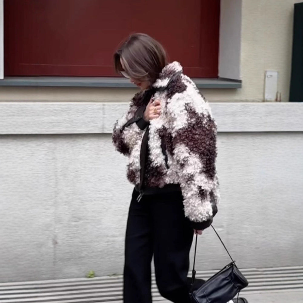 Women's short jacket made of curly bouclé faux fur with leather look detailing EVA-US