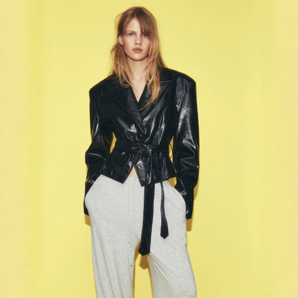 Women’s short blazer in patent leather look with waist belt and flowing lapel EVA-US