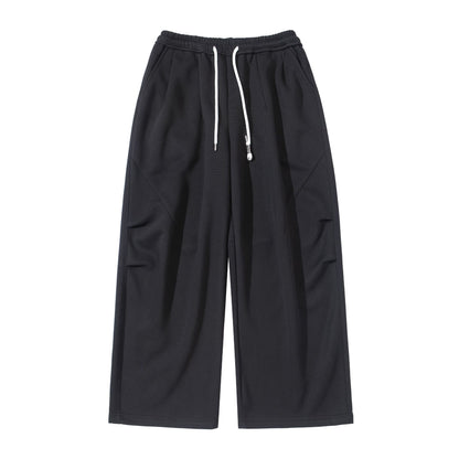 Women's Wide Cropped Jogging Pants made of French Terry with a high elastic waistband, drawstring, and side pockets EVA-US