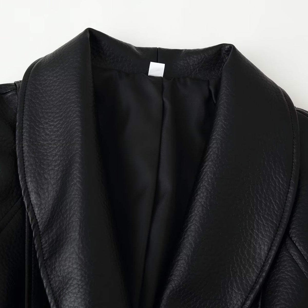 Women's short blazer made of vegan leather with shawl collar and waist tie belt EVA-US