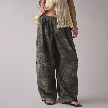 Women's wide cargo pants with elastic waistband and large flap pockets