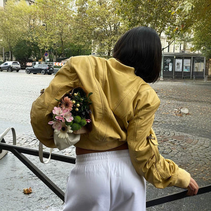 Women's short bomber jacket in boxy cut with distinctive seam details, zipper pockets and ribbed cuffs EVA-US