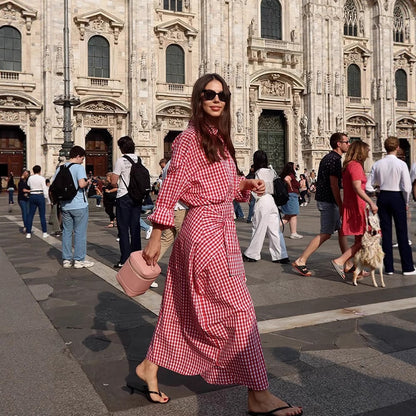 Women's checkered maxi dress with continuous button placket, fitted sash, and extended cuffs EVA-US