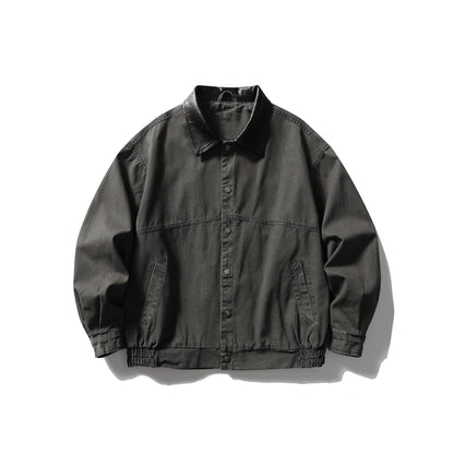 Men's tailored canvas blouson with contrasting leather collar and elastic hem.