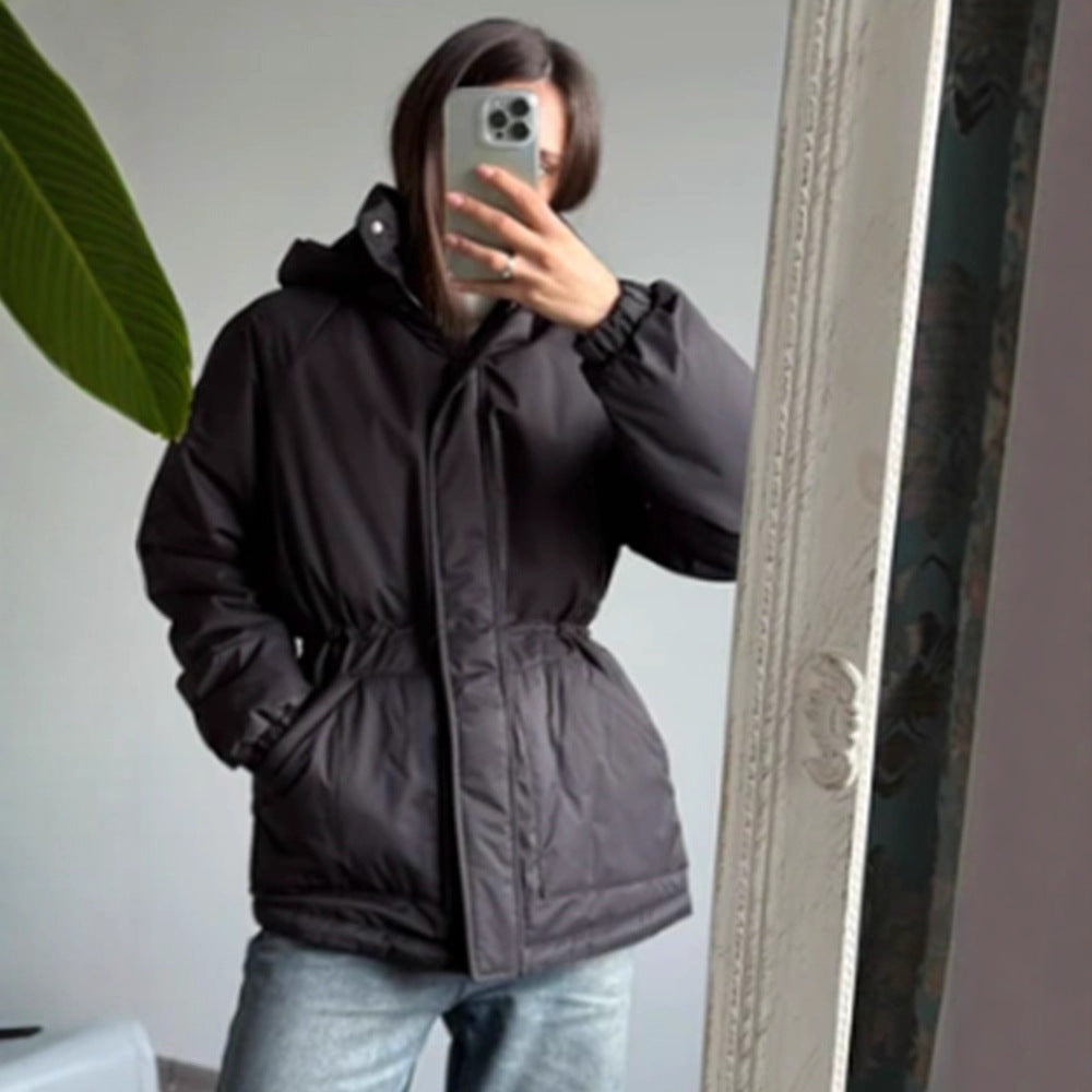 Women's quilted parka with high collar, fitted drawstring, and hood EVA-US