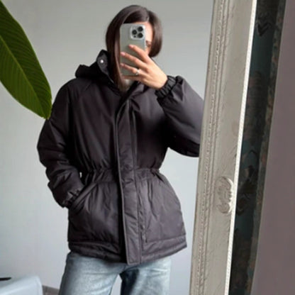 Women's quilted parka with high collar, fitted drawstring, and hood EVA-US