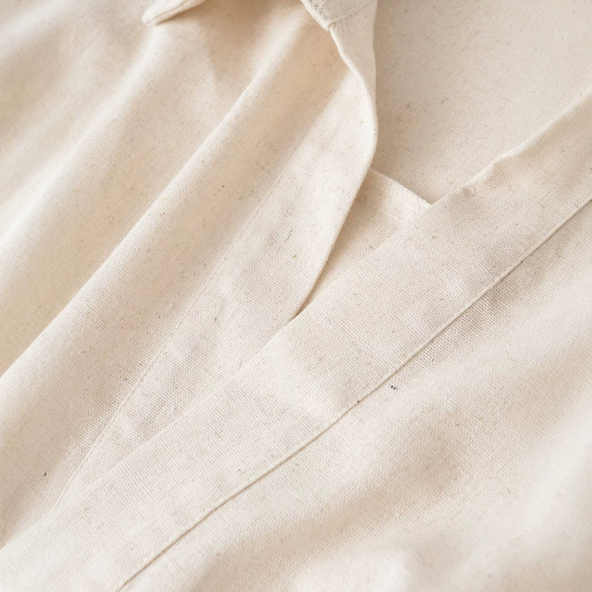 Women's Oversized Linen Blouse with Open V-Neck and Gathered Hem EVA-US