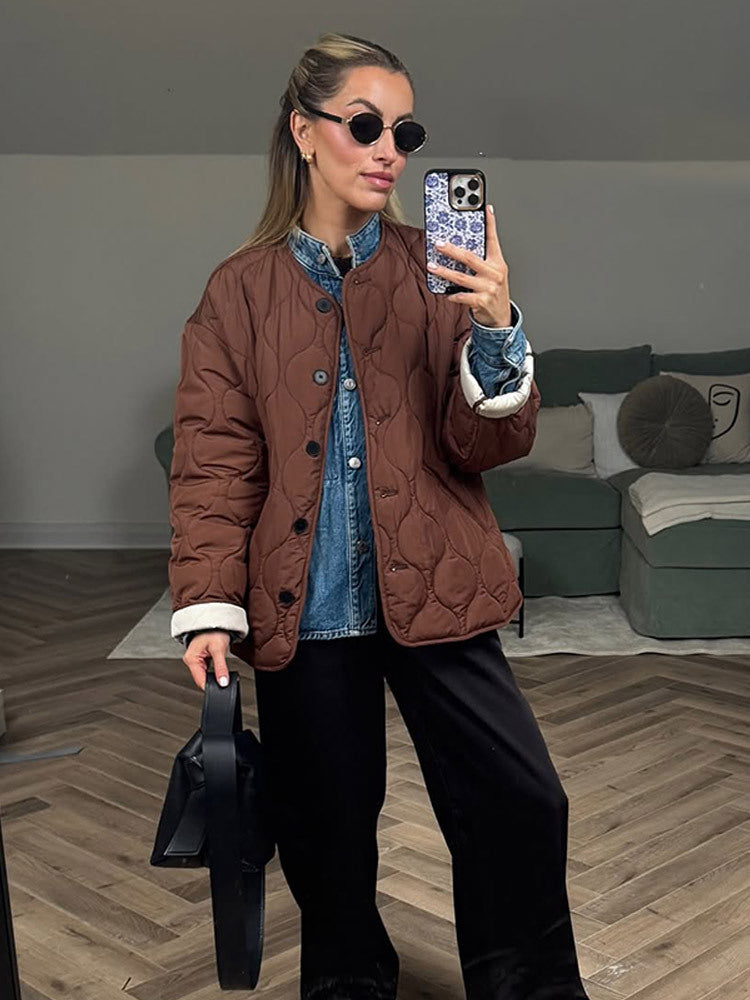Women's quilted transitional jacket with round quilting, boxy silhouette and press stud placket EVA-US