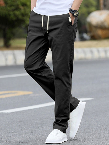 Men's sporty leisure pants with elastic waistband and modern side pockets EVA-US