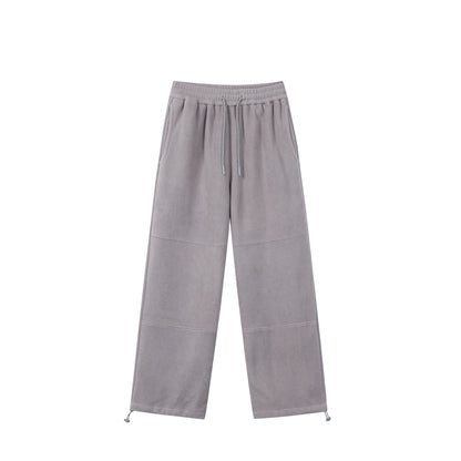 Women's Loose Fleece Jogging Pants with Drawstring Waistband, Side Pockets, and Adjustable Hem