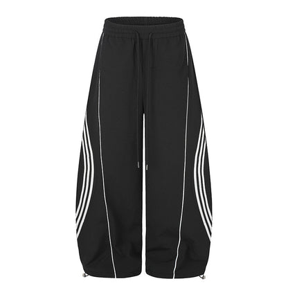 Women's Wide Tech Material Palazzo Pants with Drawstring Waistband, Reflective Side Stripes and Adjustable Cord Hem