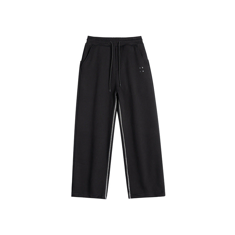 Women's sweatpants with wide legs, elastic waistband and drawstring