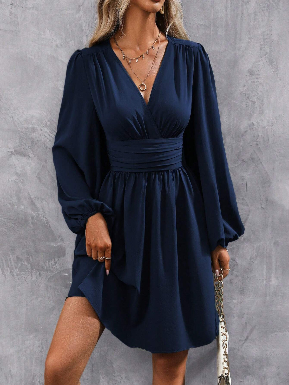 Women's wrap dress with a stylish V-neck and voluminous sleeves