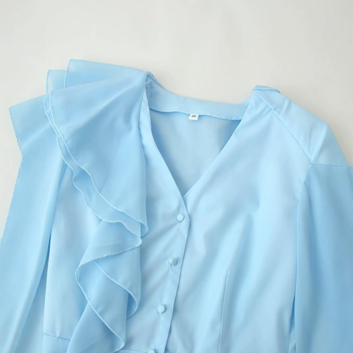 Ladies ruffle blouse with stand-up collar, ruffle details and waist belt EVA-US