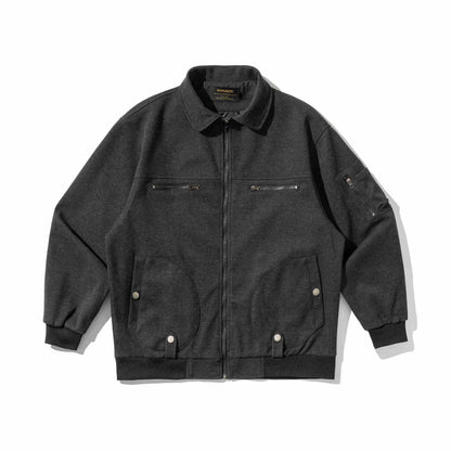 Men's short blouson in utility style with padded front, zip chest pockets and ribbed cuffs