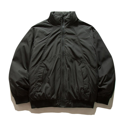 Men's boxy padded bomber jacket with high stand-up collar, elastic hem, and practical side pockets.