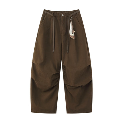Ladies wide culotte pants with elastic waistband, pleats and decorative scarf pendant EVA-US