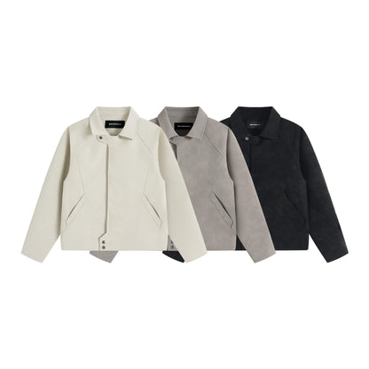 Men's short jacket in suede look with asymmetric front flap and geometric flap pockets.