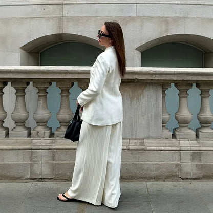 Women's tailored long blazer with a stand collar, boxy shoulder, and concealed button placket EVA-US