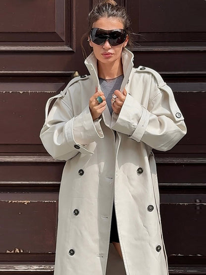 Women's waistless long trench coat in oversized cut with double button placket and shoulder flaps EVA-US