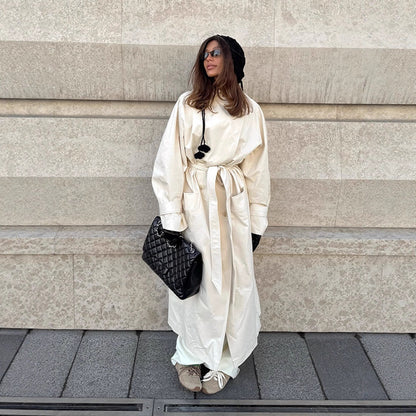 Women's maxilength tailored trench coat made of a light cotton blend with a tie belt EVA-US