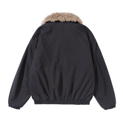 Women's short jacket with voluminous faux fur collar, kangaroo pockets, and elastic hem EVA-US