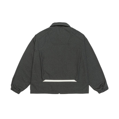 Unisex short jacket in boxy cut with shirt collar, visible metal zipper and utility patch pockets EVA-US