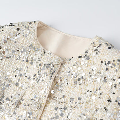 Women's short jacket made of bouclé with sequin trim, decorative pearl buttons, and a belted waist EVA-US