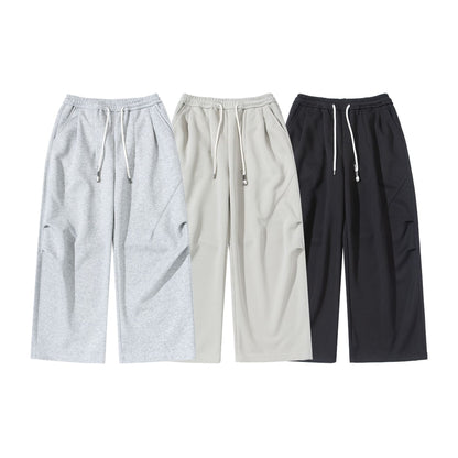 Women's Wide Cropped Jogging Pants made of French Terry with a high elastic waistband, drawstring, and side pockets EVA-US