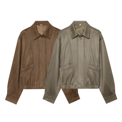 Women's cropped blouson jacket in suede look with shirt collar, epaulettes, and elastic waistband.