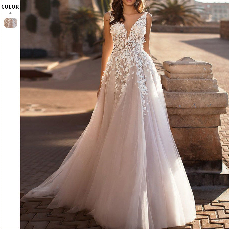 Women’s wedding dress with floral 3D appliqués and tulle skirt – A-line, V-neck