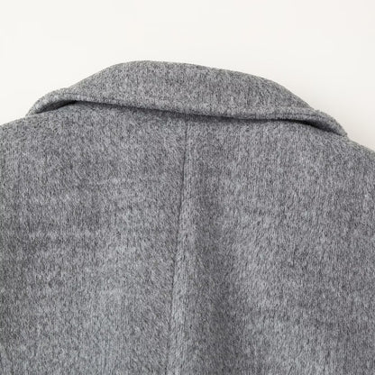 Women's short blazer coat made of wool blend with lapel collar, two-button closure, and patch pockets EVA-US
