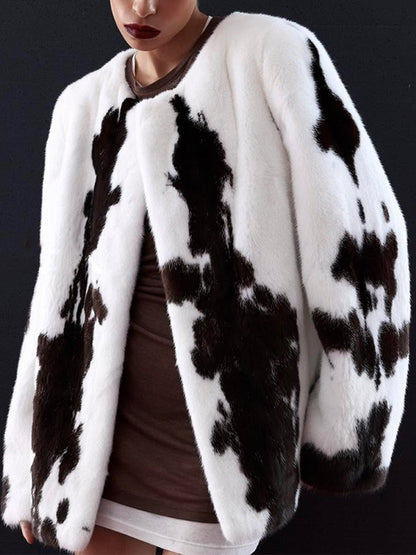 Women's short coat made of faux fur with boxy silhouette and cow print pattern EVA-US