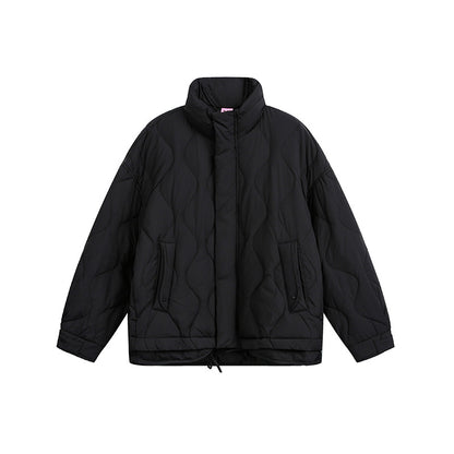 Women's oversized quilted jacket with stand-up collar, wave quilting, and drawstring hood