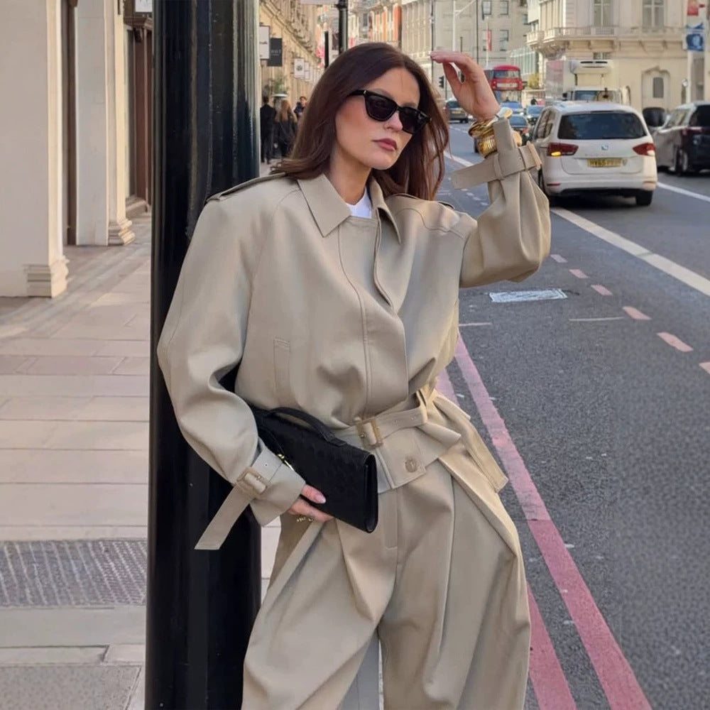 Ladies tailored short trench coat with tie belt, raglan sleeves and concealed button placket EVA-US