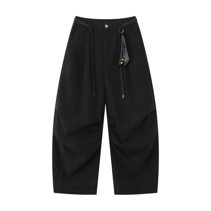 Ladies wide culotte pants with elastic waistband, pleats and decorative scarf pendant EVA-US