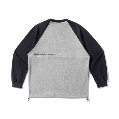 Unisex Raglan Sweatshirt with thermal waffle texture, drawstring hem, and discreet chest embroidery EVA-US